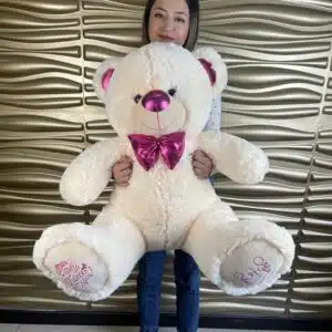 Oso 110 cm medida total color crema fucsia brillante personalizado en huellas